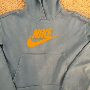 Nike Girls Size Medium Light Blue Hi Low Pullover with Yellow Gold Logo